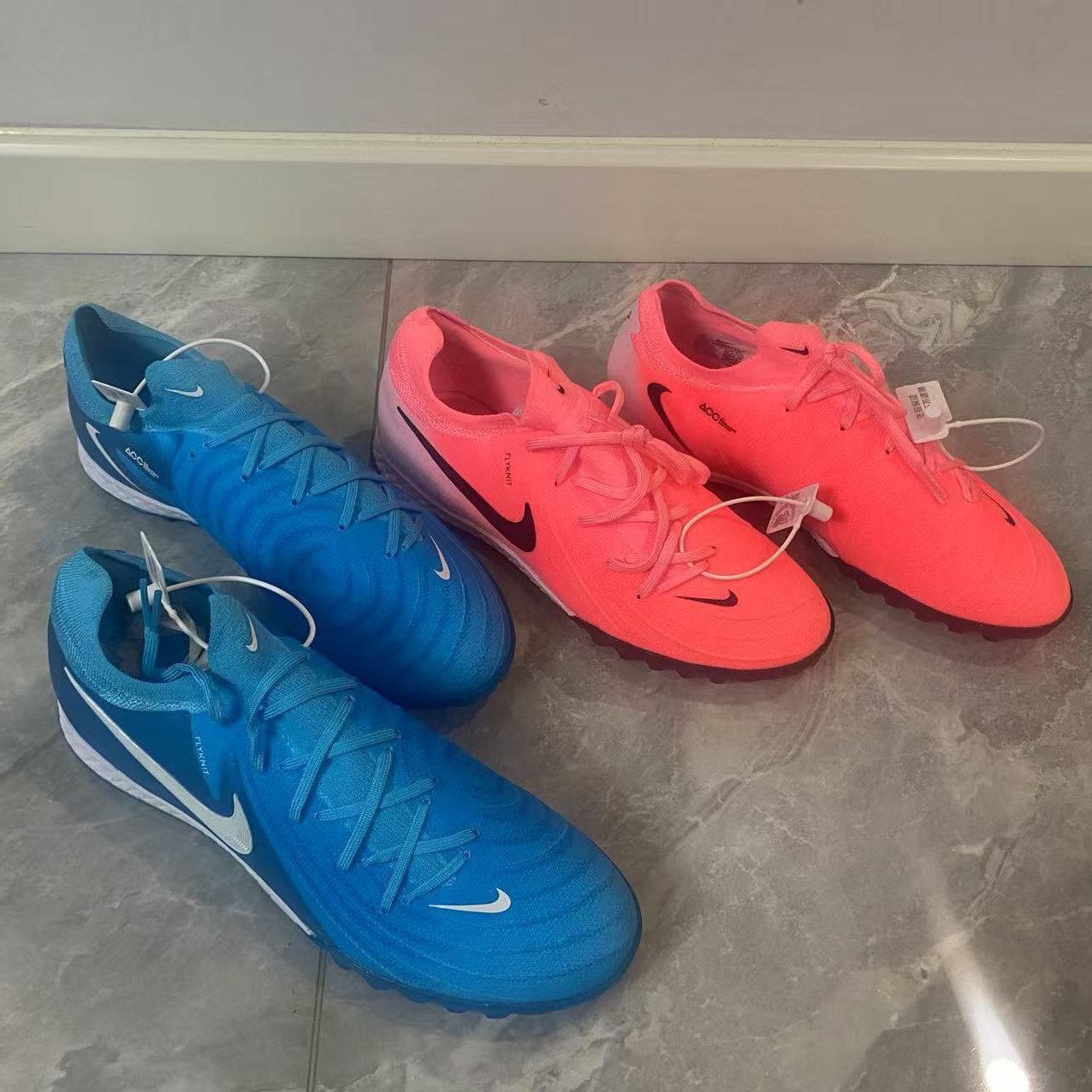 Nike Phantom GX PRO TF 男子次顶碎钉人造草足球鞋 FJ2583-400