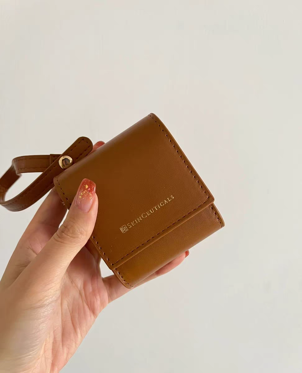 修丽可简约小巧棕色皮质手拎耳机包卡包口红迷你化妆包可放车钥匙