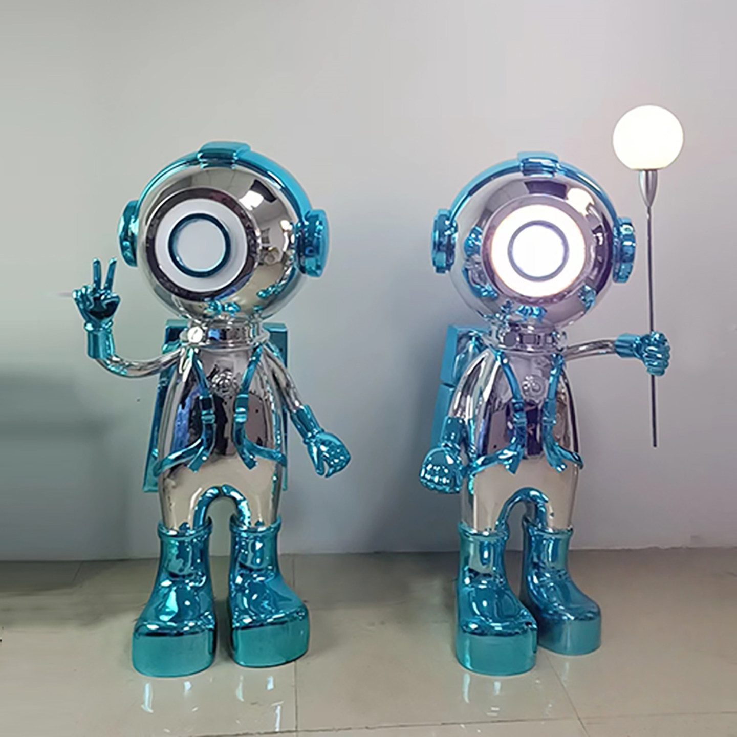 玻璃钢雕塑定制创意宇航员机器人LED装饰摆件高级感小众落地艺术