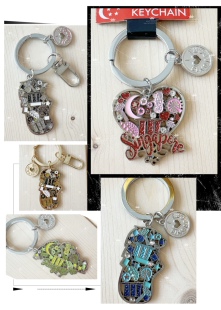 新加坡机场动物园滨海湾特色鱼尾狮纪念品手信礼镂空钥匙扣挂