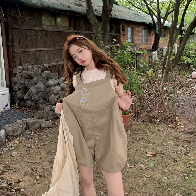 Real time picture of Ruffle neckline cuff shirt + net red retro ocean style age reducing one-piece Suspenders