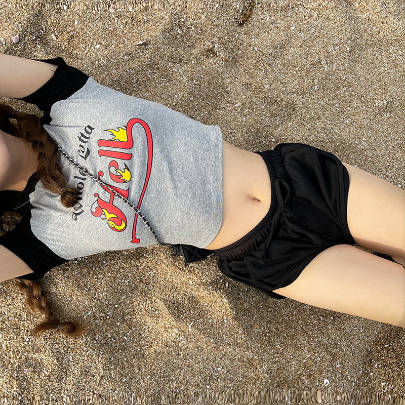 Real shot of Xiaxin short fit color matching t-shirt female sexy navel exposed flame letter top