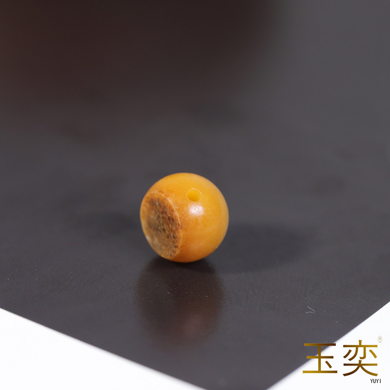 和田玉籽料黄沁留皮金镶玉单珠