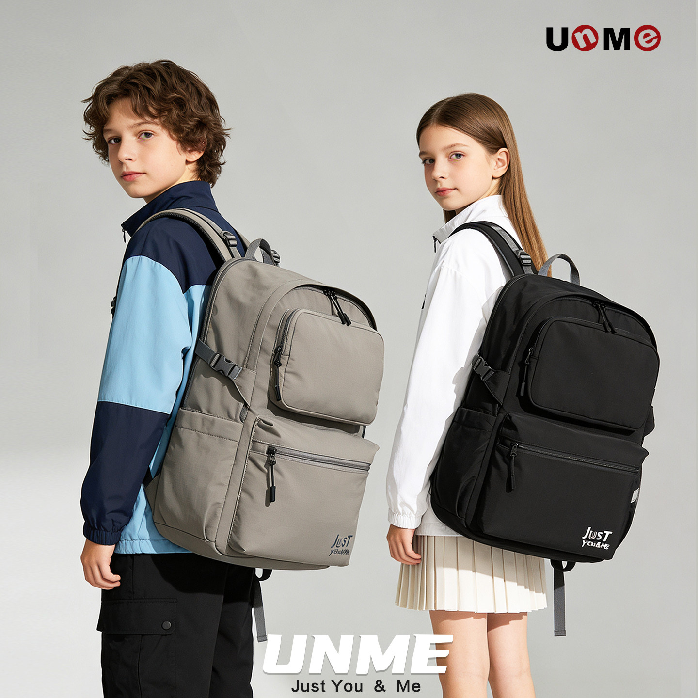 2026新品unme中学生大容量减负书包女男高中生防水黑色旅行双肩包
