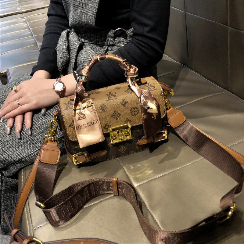 真皮手提小包单肩小方包潮