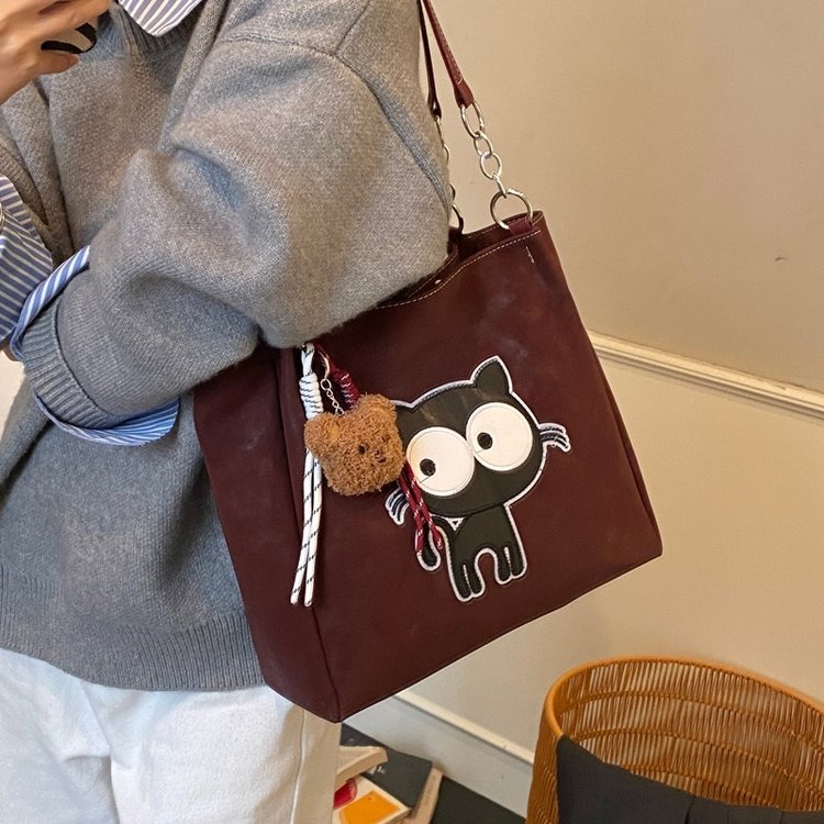 高级感2025秋季新款通用款女包春季带挂件女均码单肩包休闲简约风