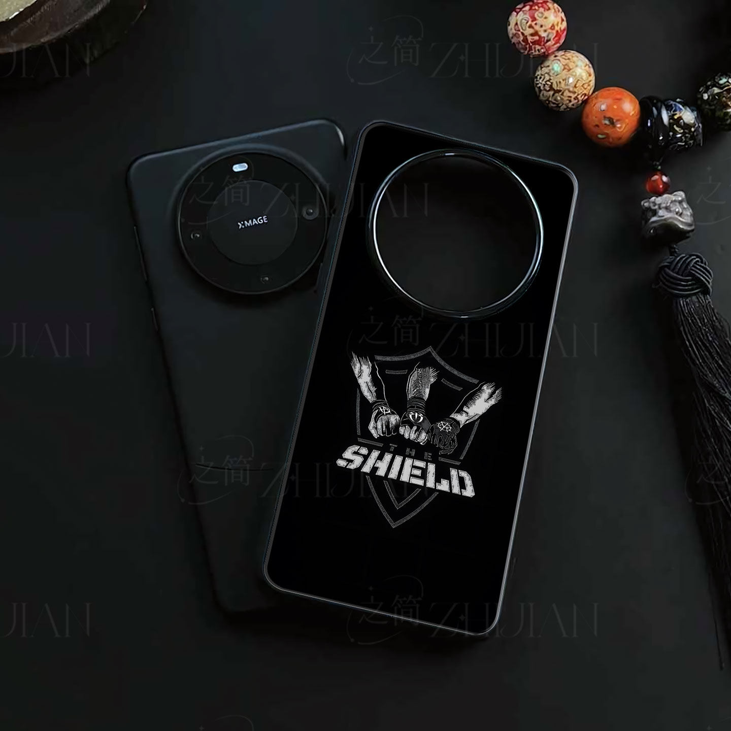 WWE圣盾标志磁吸磨砂黑框电镀玻璃手机壳适用苹果iphone17promax华为红米K80至尊版NOVA14PRONOVA7SE1加12