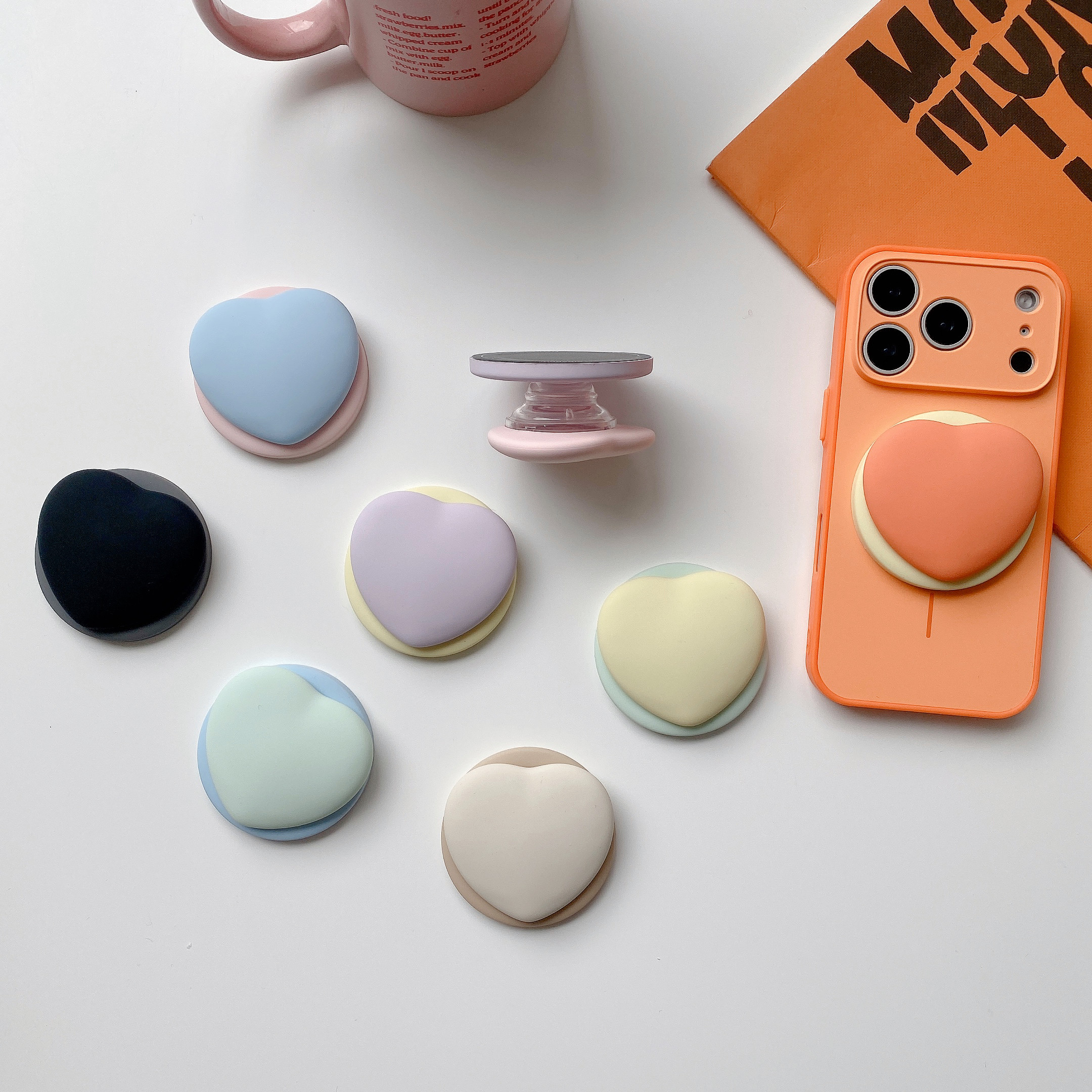 MagSafe磁吸硅胶爱心手机支架气囊苹果安卓伸缩底座追剧神器新