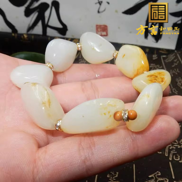 方言企业手串精品玉龙河产红金皮羊脂白玉无修磨籽料原石手链子F
