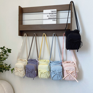 2025新款户外轻便蝴蝶结束口斜挎包防水手机包保温水壶包女单肩包