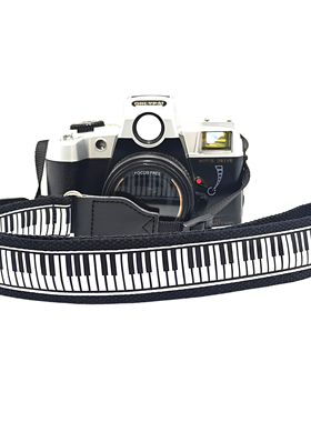 黑白琴键百搭美新年礼物斜挎挂脖调节相机CCD单反微单拍立得背带