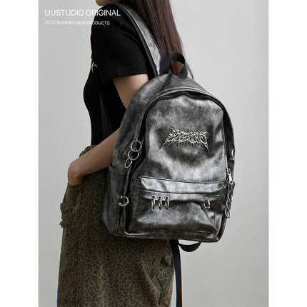 uustudio小众原创设计暗黑朋克穿刺铆钉潮复古大容量双肩学生背包
