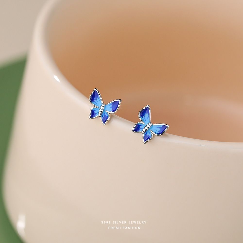 滴胶蓝色蝴蝶耳钉女s999纯银森系小清新小众设计百搭足银耳饰