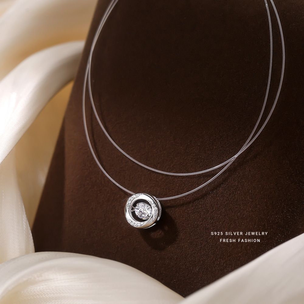 S925纯银莫比乌斯心动锆石吊坠2025女款百搭透明鱼线项链人鱼之泪