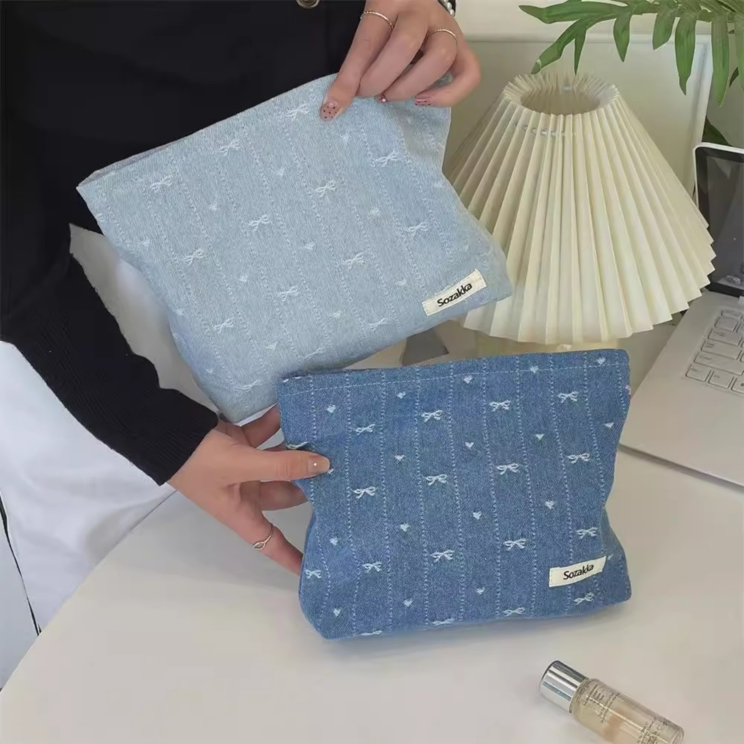 牛仔蝴蝶结手拿化妆包大容量拉链