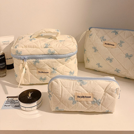 好可爱!奶蓝色蝴蝶结化妆包女便携旅行大容量化妆品收纳包洗漱包