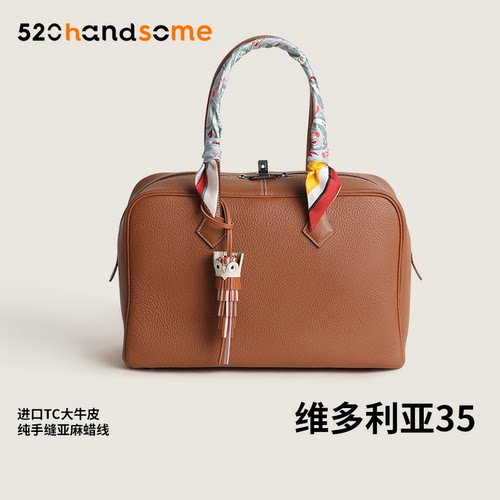 进口真皮帆布拉链手提包