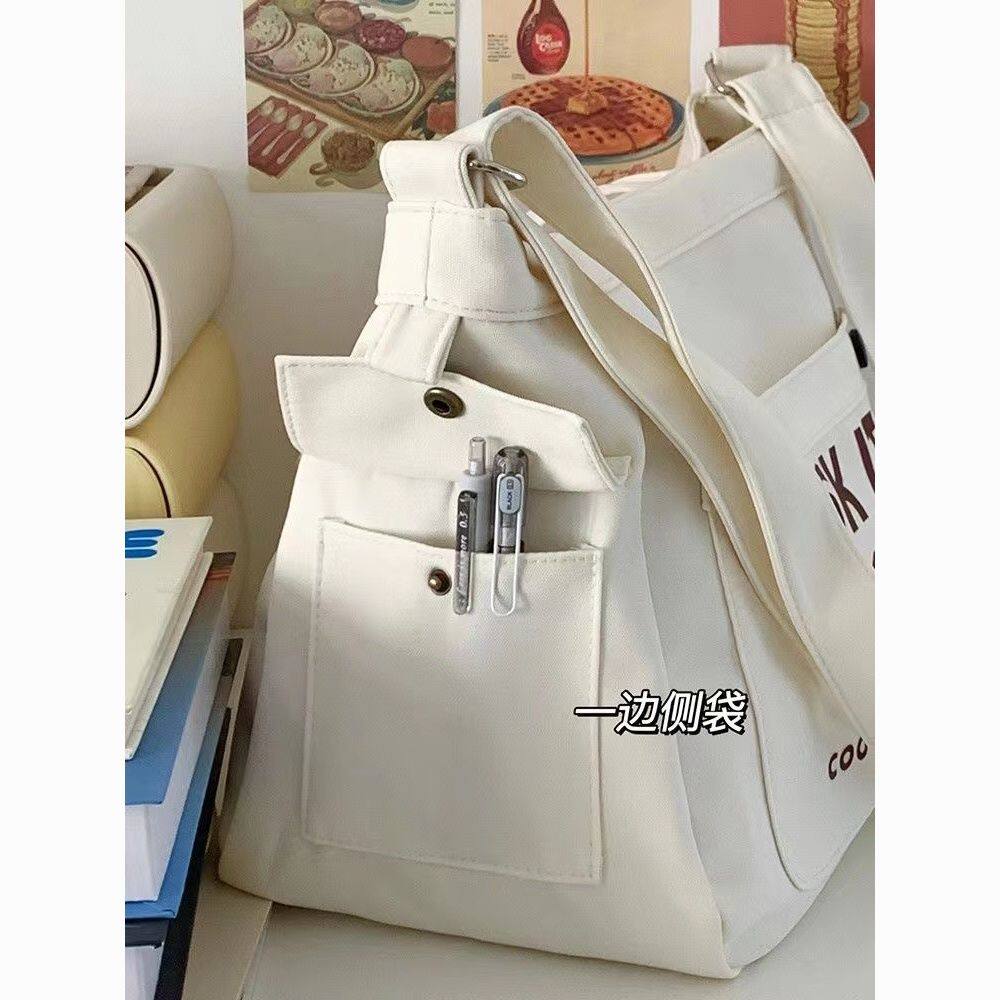 新款学生帆布包ins大容量单肩斜挎包女大学生简约百搭手提袋书包