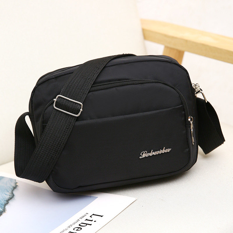 2025新款斜挎包男女通用单肩包多层拉链防水尼龙牛津布生意小包包