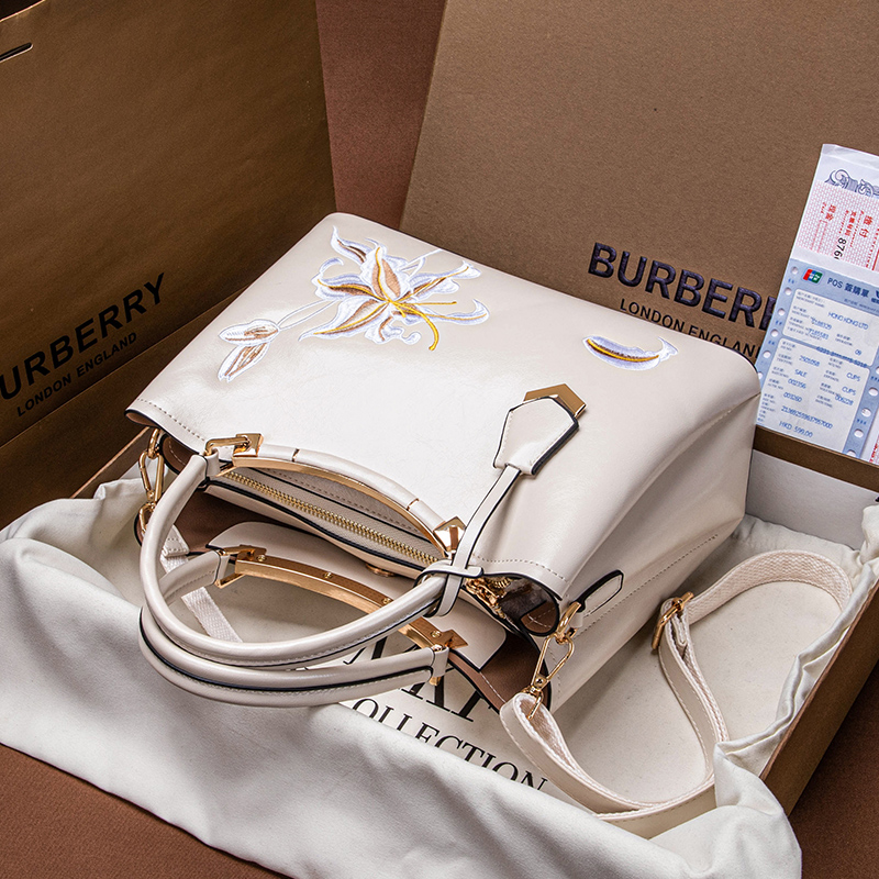 正品刺绣手提女式包包新款时尚气质妈妈包通勤真皮单肩斜挎托特包