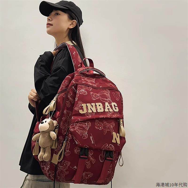 法国MKBM大容量印花后揹包女新款减负护脊学生书包轻便出行登山包