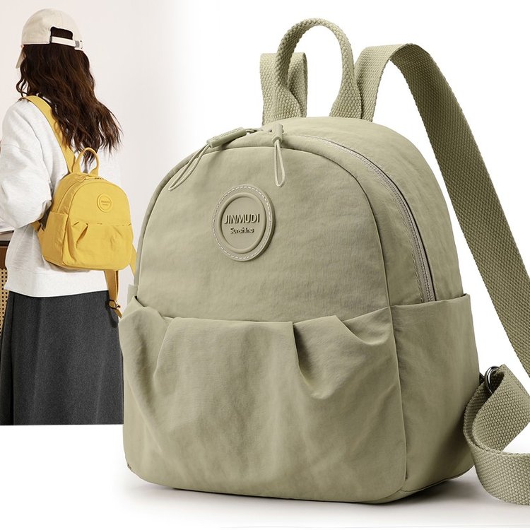 双肩包超轻2025新款高级感小众尼龙帆布上班通勤旅行背包小型轻便