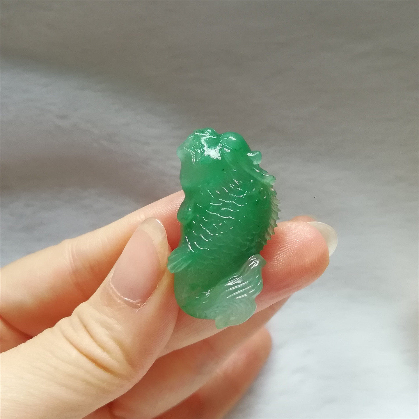 天然独龙玉精雕龙鱼吊坠