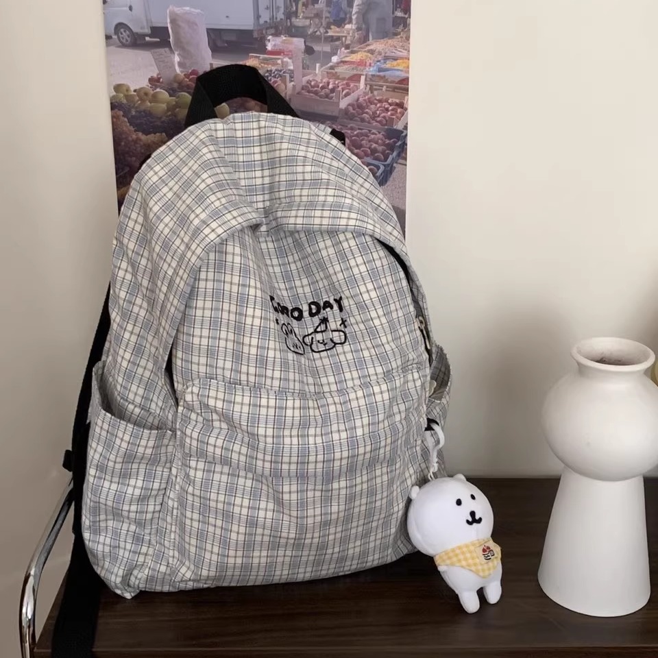 日系格子小众书包女款大学生韩版大容量旅行轻便背包简约双肩包包