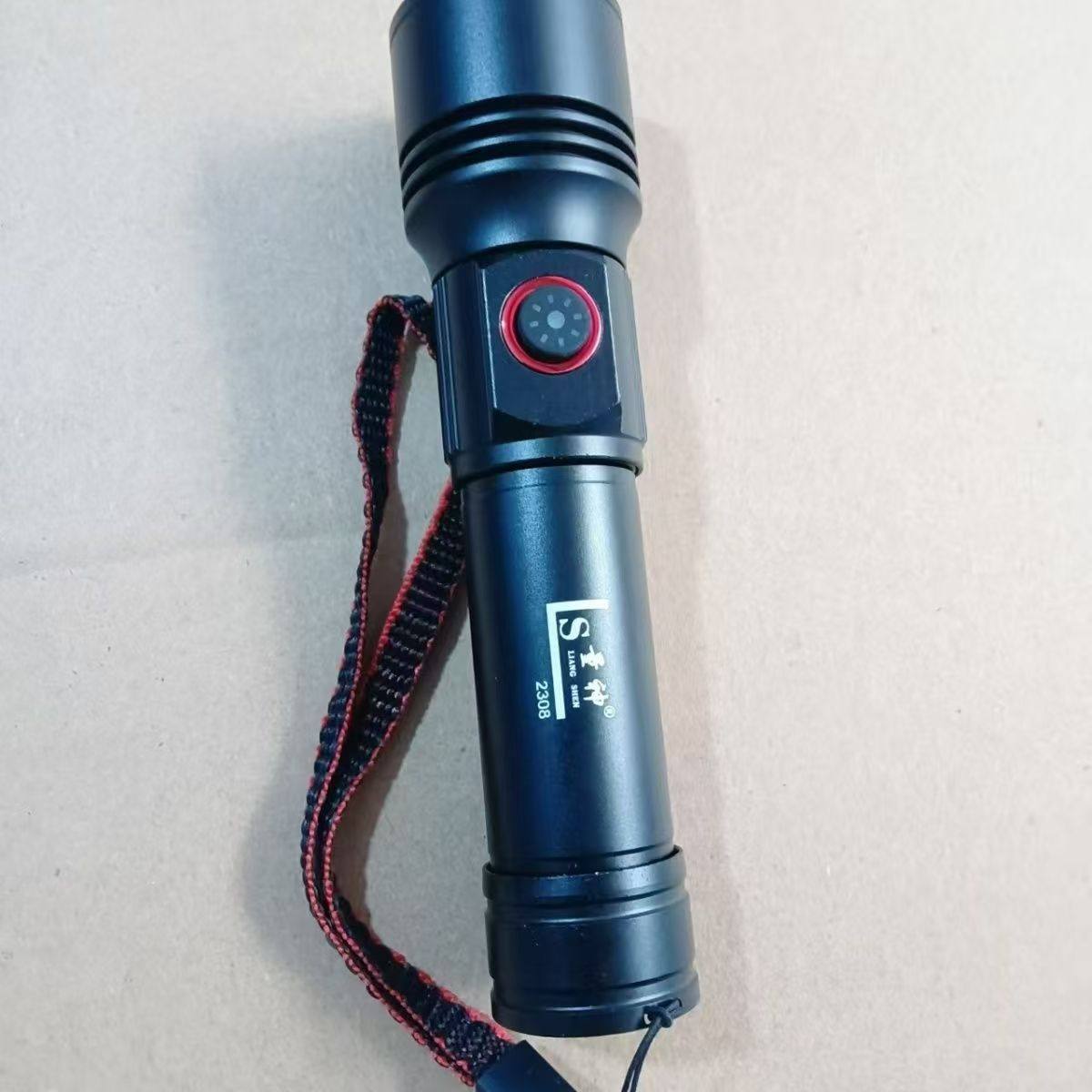 量神2308白激光强光超亮手电筒户外远射大功率充电镭射灯