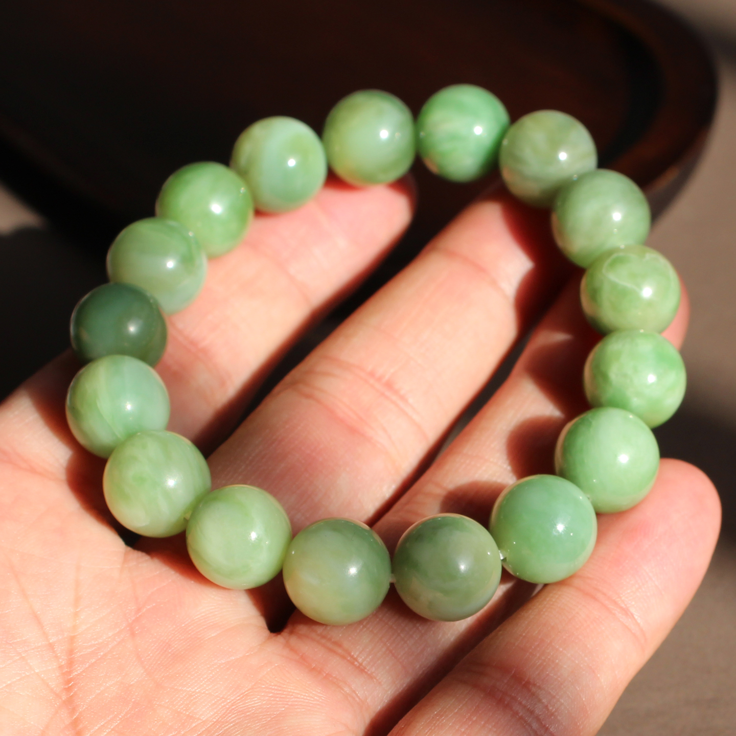 方言和田玉精品俄罗斯老坑碧玉冰底黄猫眼阳绿色12mm圆珠玉手链A1