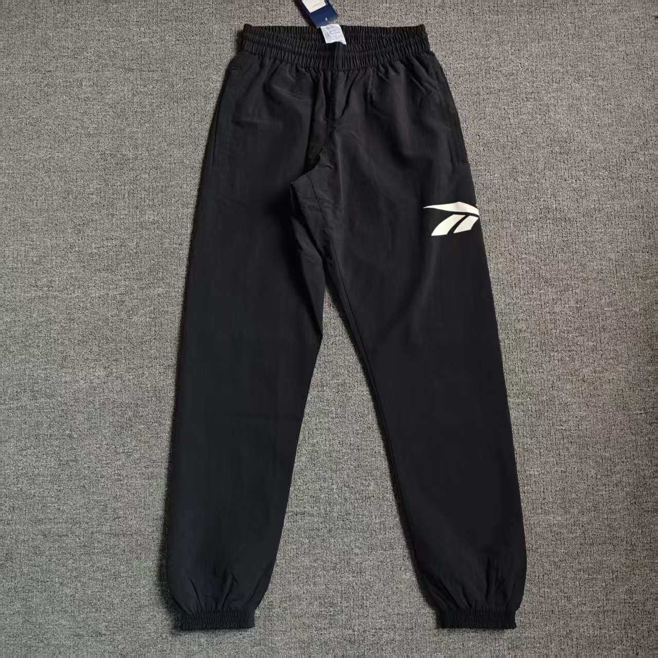 REEBOK锐步男子复古梭织双层大LOGO运动收脚长裤IA2512