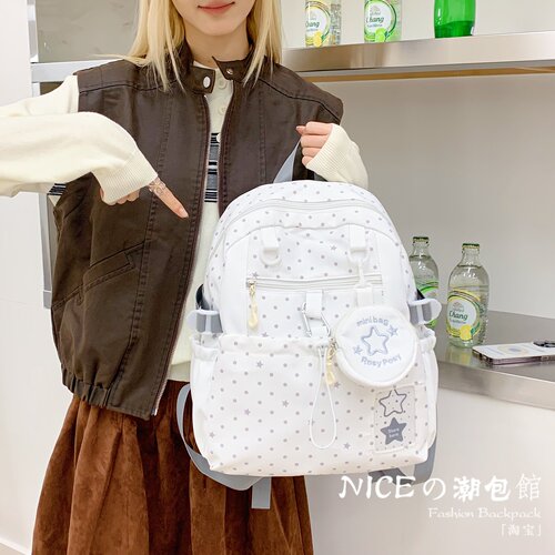 波点抽绳书包女大学生背包