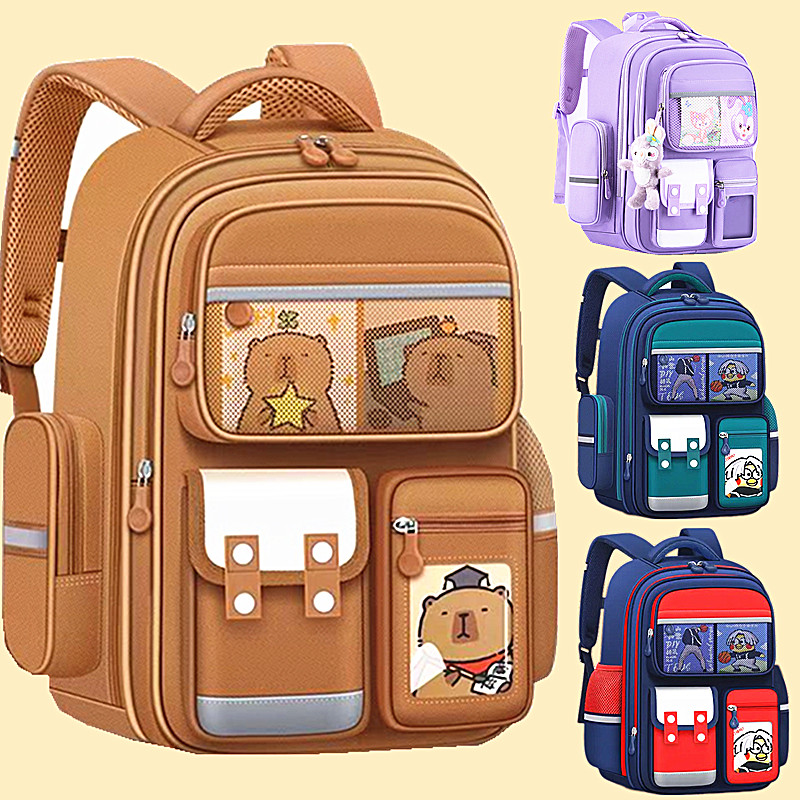 新款书包小学生男童女孩一二三五六年级减负护脊轻便防水双肩背包