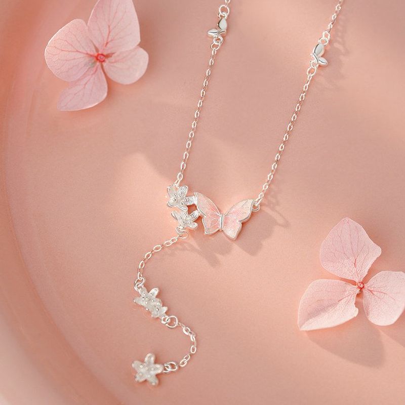 足银S999滴胶蝴蝶花朵流苏项链清新森系淡雅小众显瘦锁骨链代发