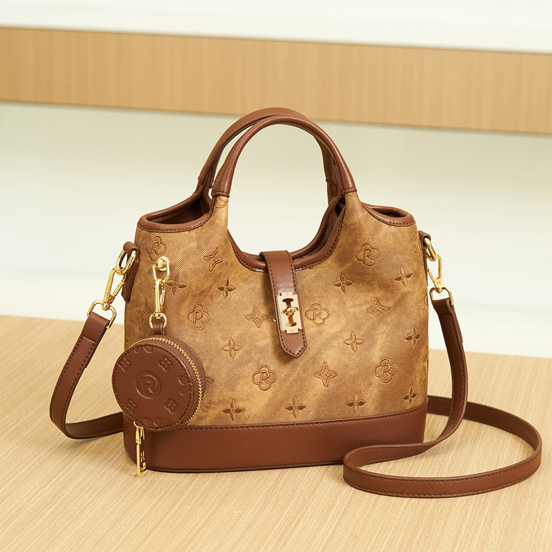 头层牛皮手提包女软真皮单肩斜挎水桶包时尚复古潮流2025新款百搭,箱包皮具/热销女包/男包,水桶包,淘宝优惠券,粉丝福利购,淘宝优惠卷