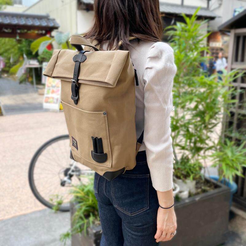 日本代购直邮日本制黑犬印折叠防水帆布双肩通勤休闲包男女款