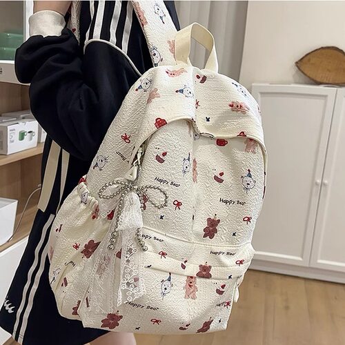 可爱卡通书包轻便书包女生小学生
