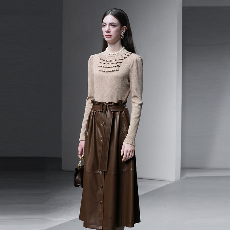 2025冬季新款时尚千金风修身亮丝毛衣+系带气质大摆PU皮半裙套装