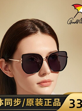 街拍太阳镜花雨伞街拍时尚蝶形