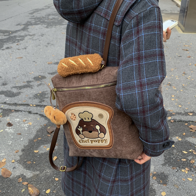 潮流休闲百搭通勤双肩包卡通