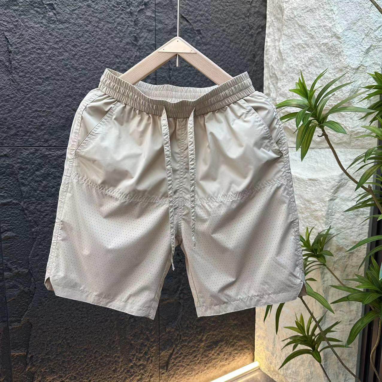 夏季新款速干宽松休闲潮流薄款打孔男士运动时尚透气外穿短裤,男装,休闲裤,淘宝优惠券,粉丝福利购,淘宝优惠卷