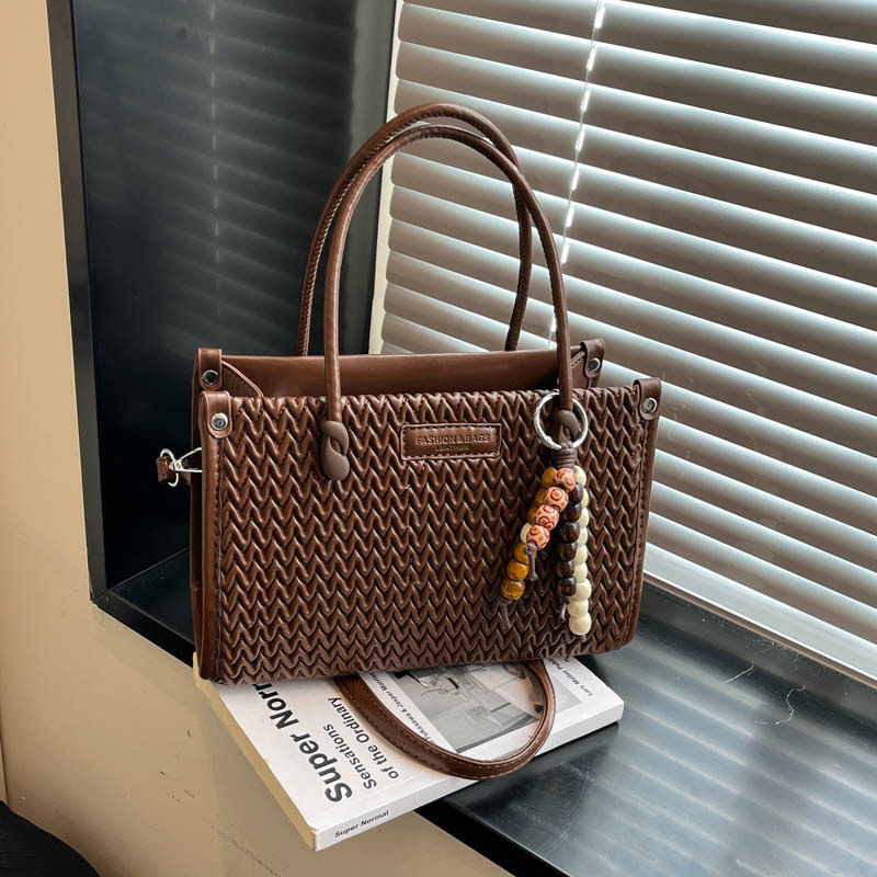 手拎水桶包包女2026新款春季高级感复古小众超火单肩包通勤斜挎包,箱包皮具/热销女包/男包,单肩包,淘宝优惠券,粉丝福利购,淘宝优惠卷