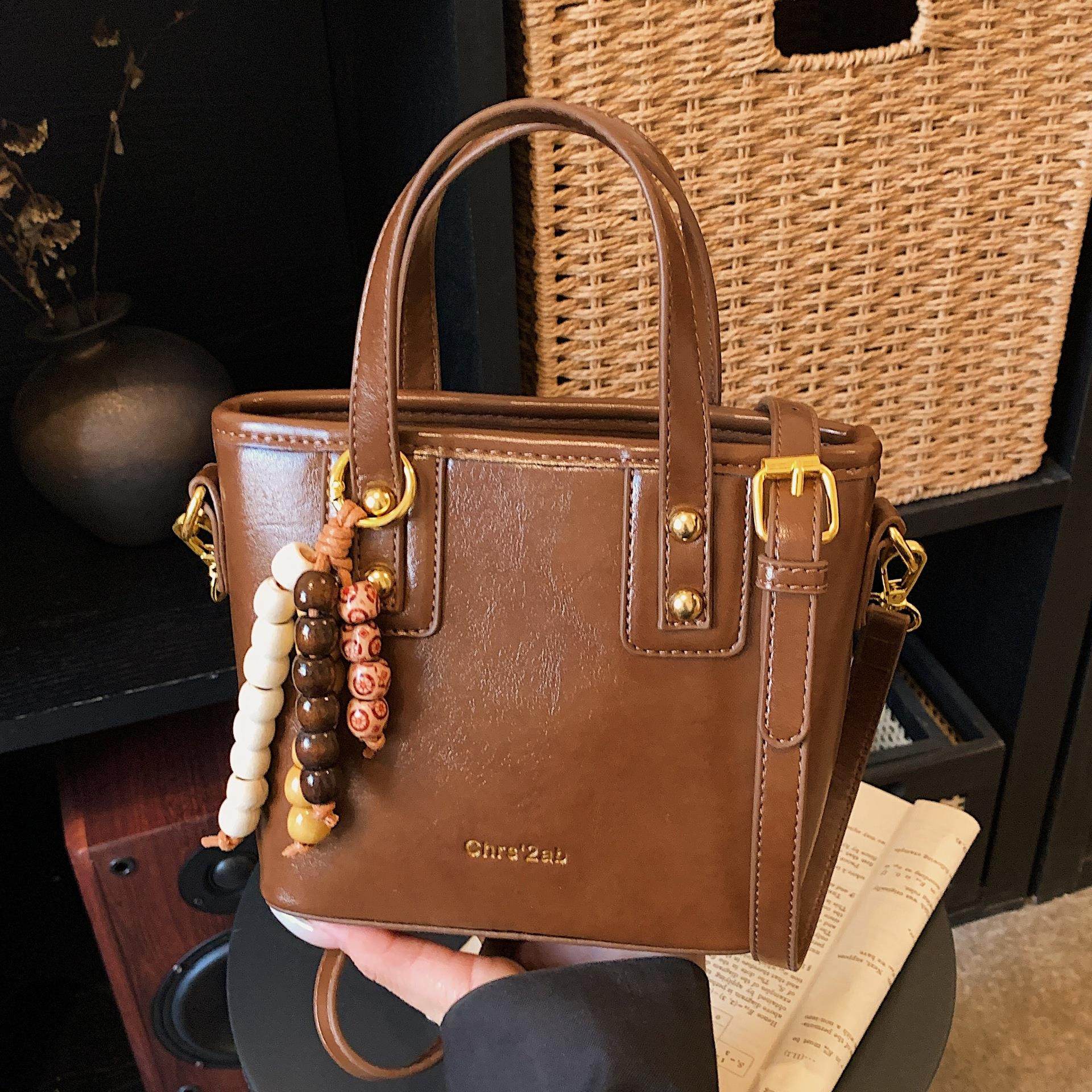 手提包包女式2026新款潮小众高级感轻奢百搭单肩包精致斜挎水桶包,箱包皮具/热销女包/男包,腋下包,淘宝优惠券,粉丝福利购,淘宝优惠卷