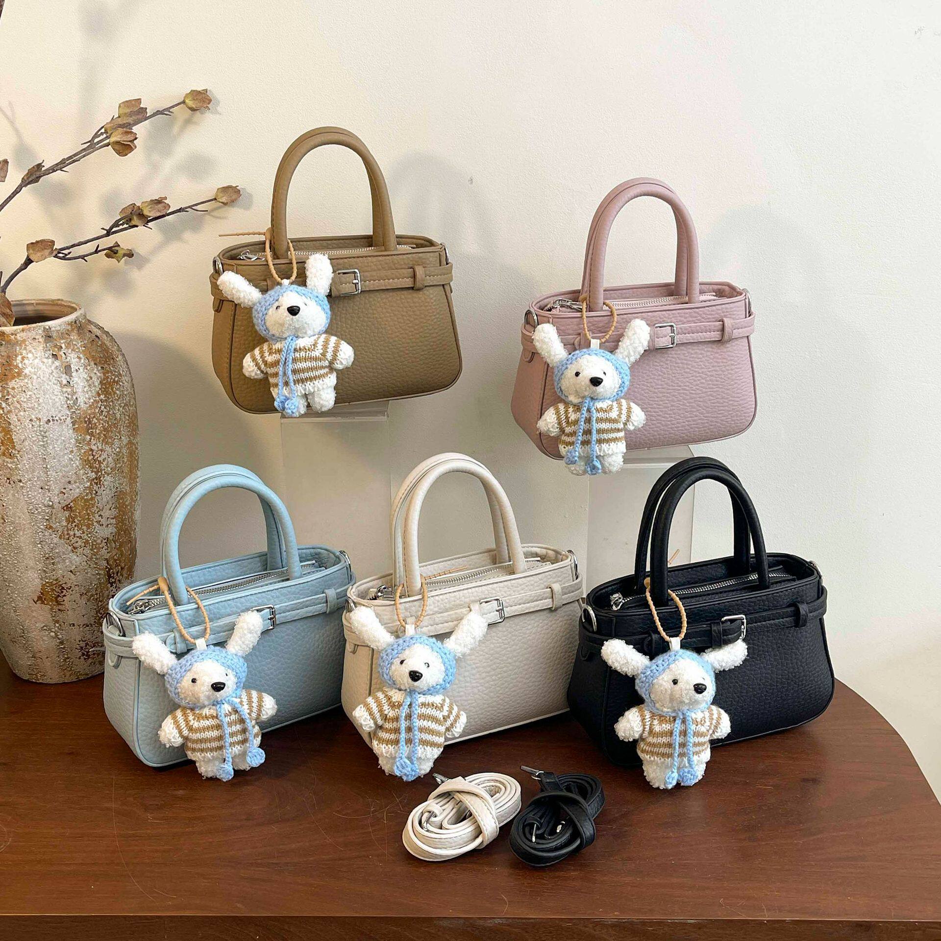 高级感水桶小包包女2026新款时尚百搭休闲小众设计单肩手提斜挎包