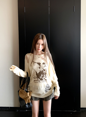 游牧风破洞长袖针织衫宽松女早秋薄款人像小众设计感带柳钉毛衣