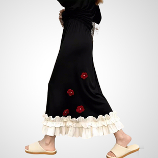 兰卡时尚温柔风黑色半身裙女2026春款撞色荷叶边大裙摆百搭中长裙