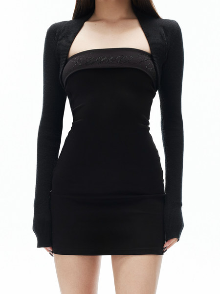 Black long-sleeve mini dress worn by a model