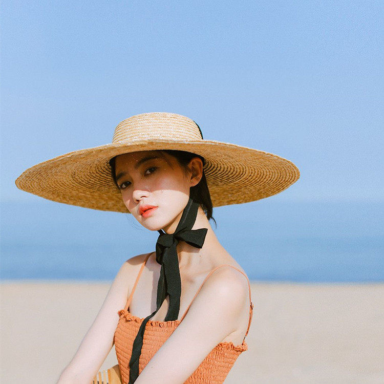 欧美小众走秀款系带绑带麦秆草帽女夏季出游沙滩帽超大檐遮阳帽子