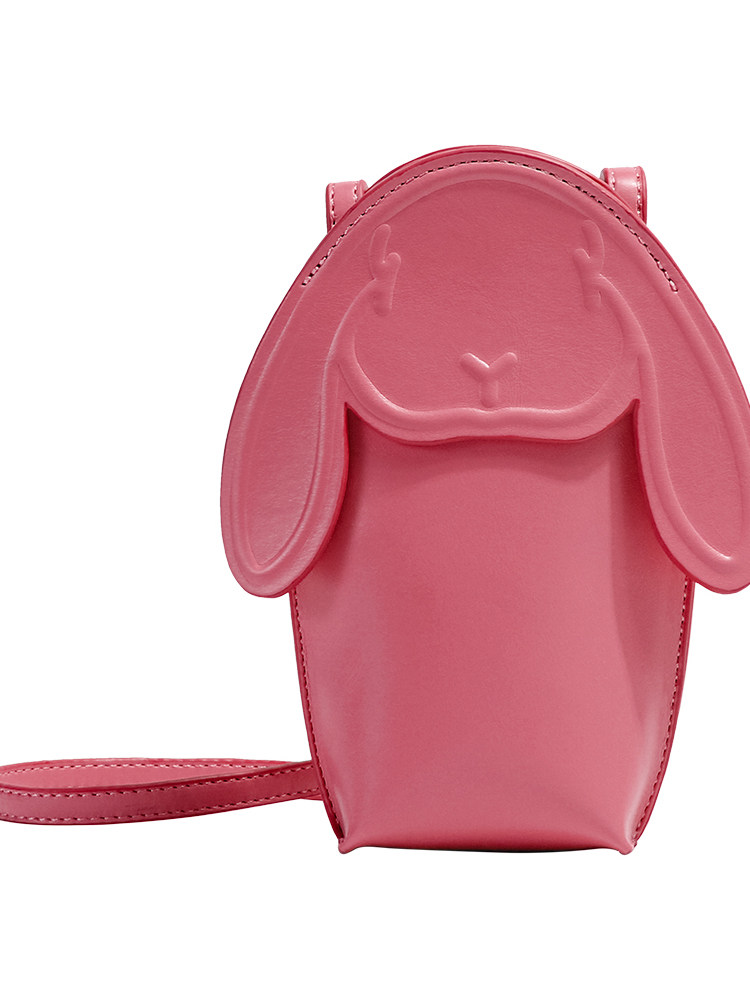 Pink bunny-shaped crossbody bag on a white background