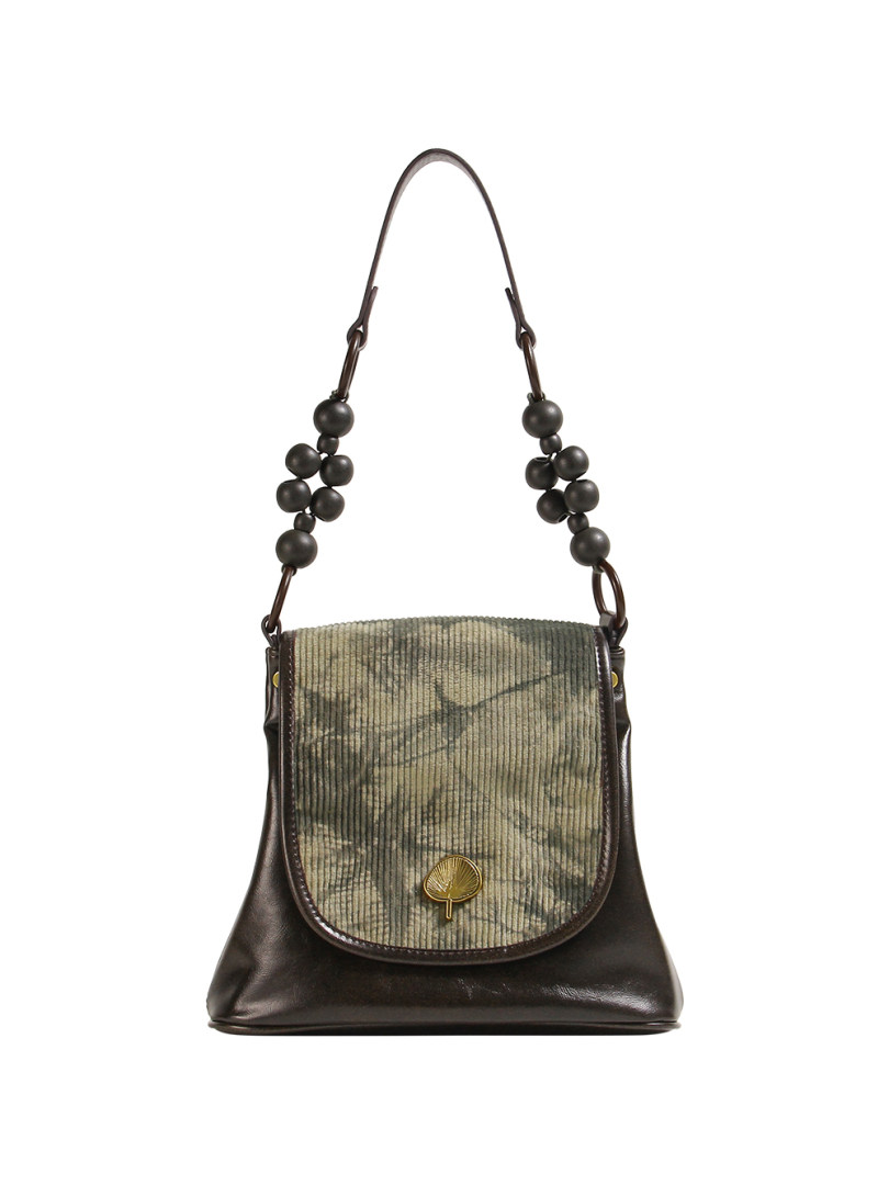 Dark brown shoulder handbag with patterned flap and beaded strap